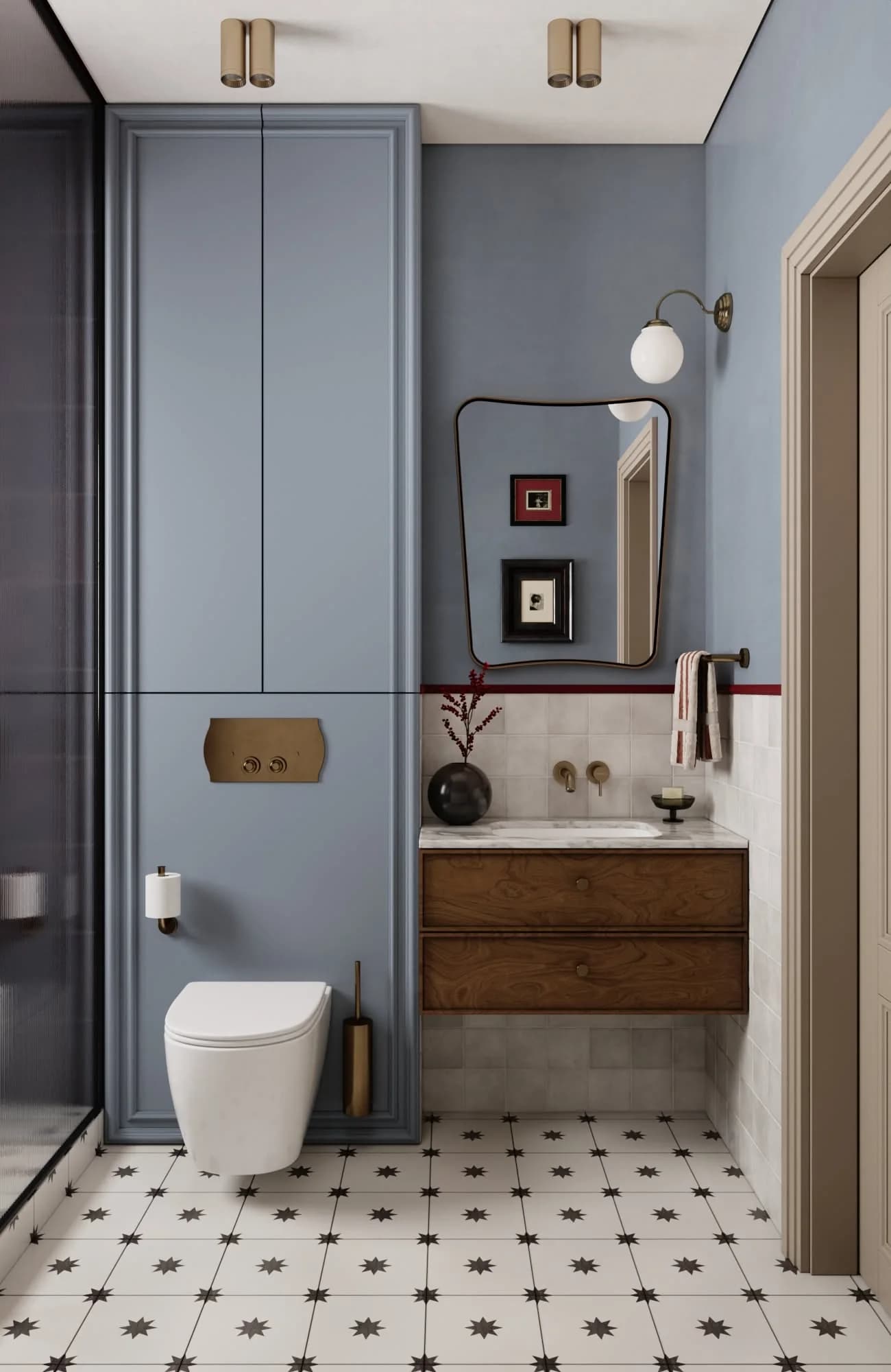 Small bathroom painted dusty blue on the walls and built-in cupboard, with a wall-hung toilet, a floating wood vanity, a curved mirror and black and white patterned floor tile