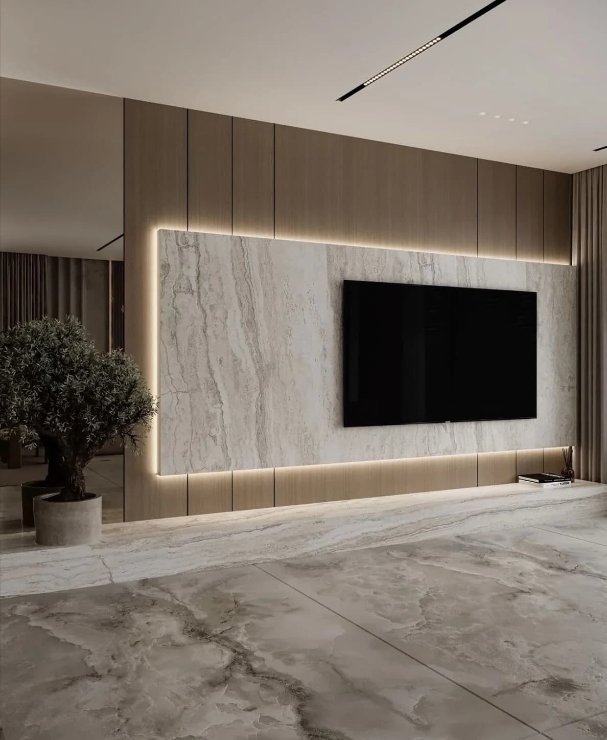 Panel de piedra clara con luz LED en el contorno sobre una pared de madera, con la tele al centro y un olivo en maceta